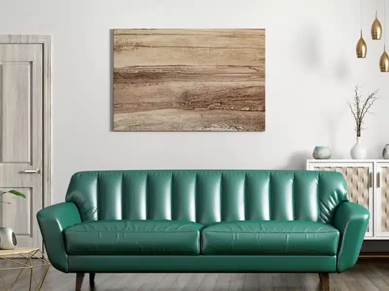 Green leather couch in a living room