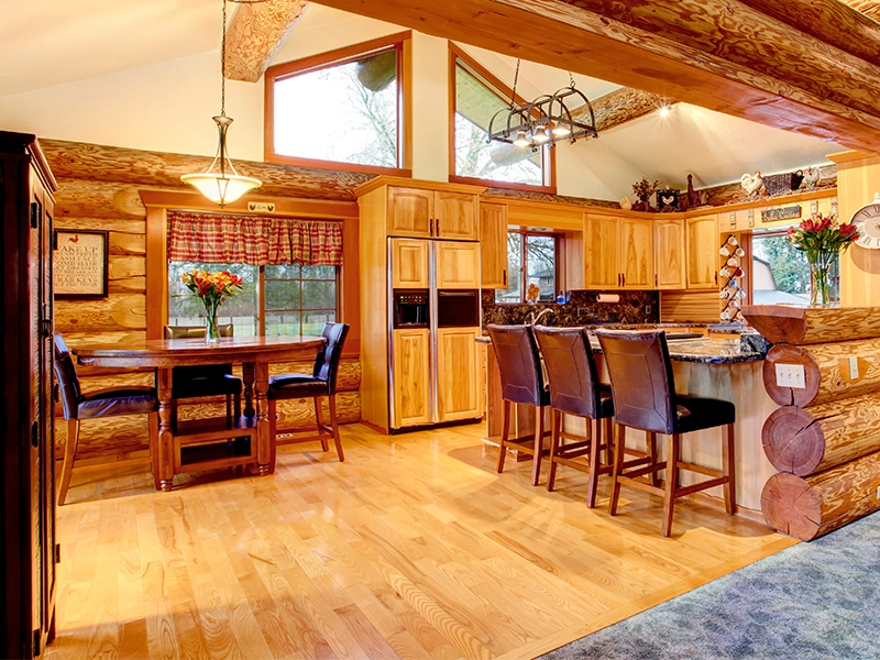 The kitchen area in a traditional log cabin