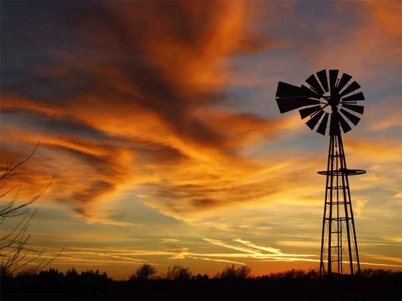 Sunset picture of an old style windmill in Kansas.