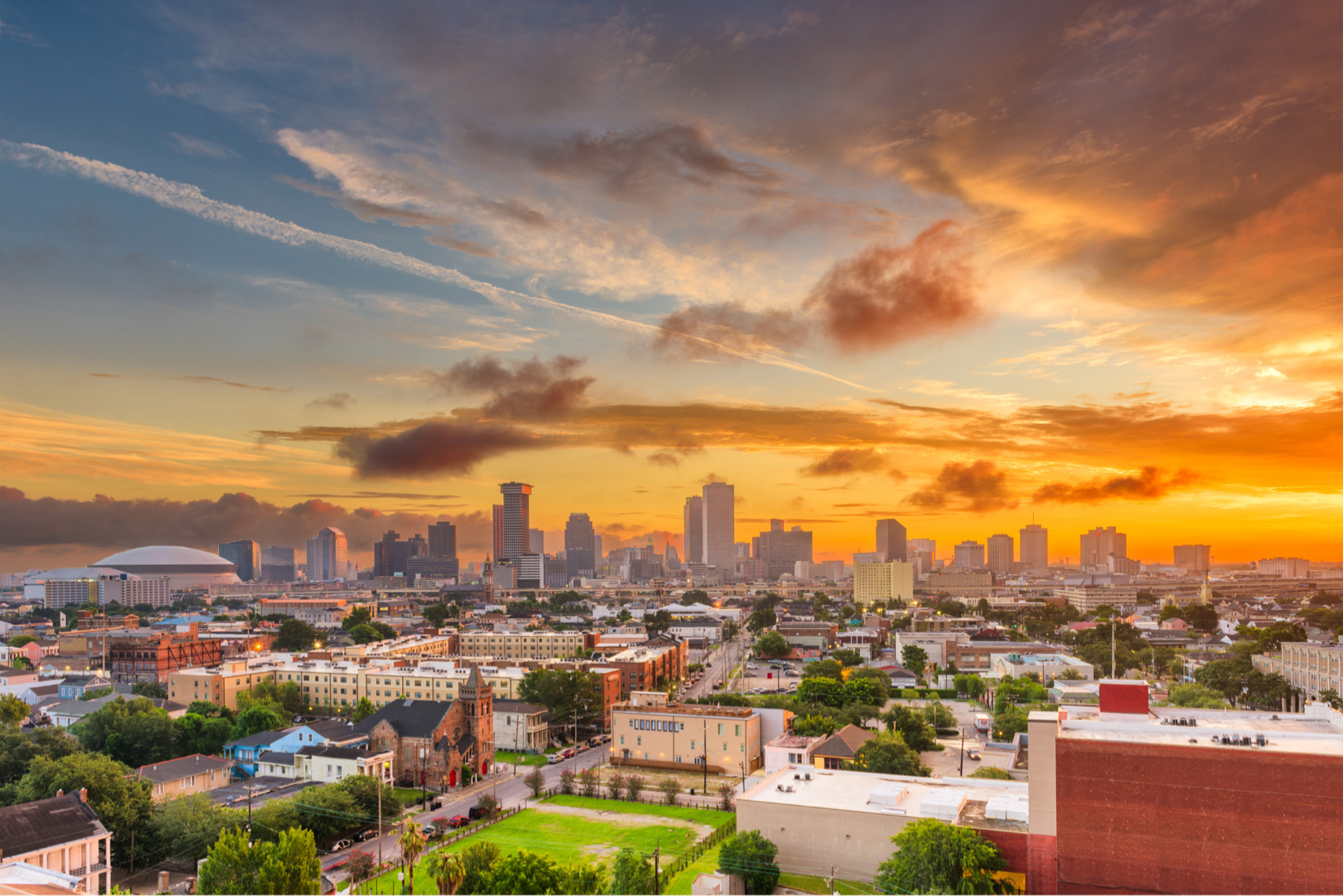 Picture of city skyline, New Orleans, and buildings.