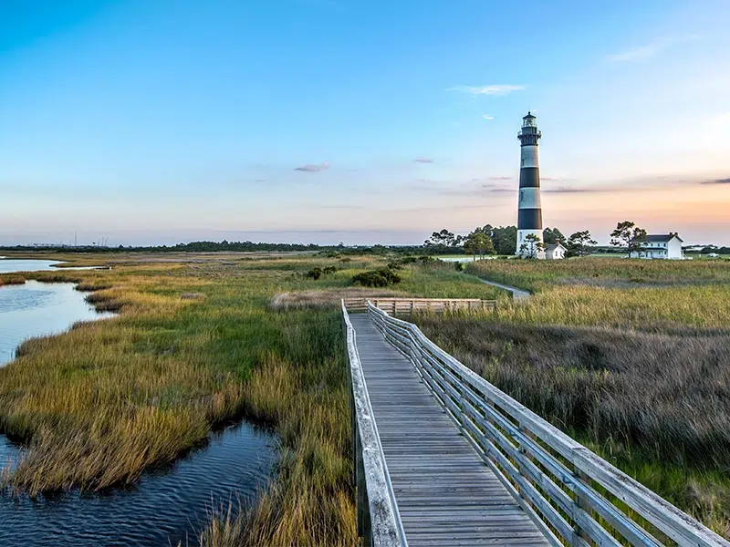 A lighthouse in the Outer Banks, NC, a popular short-term rental destination. 