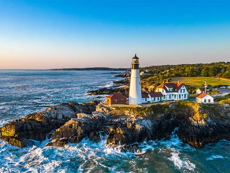 Scenic Maine coastline with lighthouse